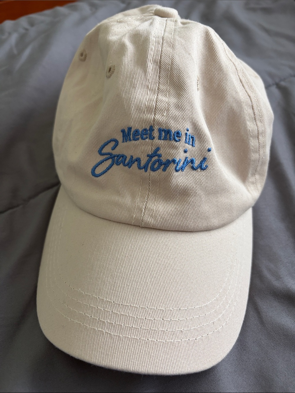 Francesca's Collections Cream Baseball Cap with Blue Embroidered Script